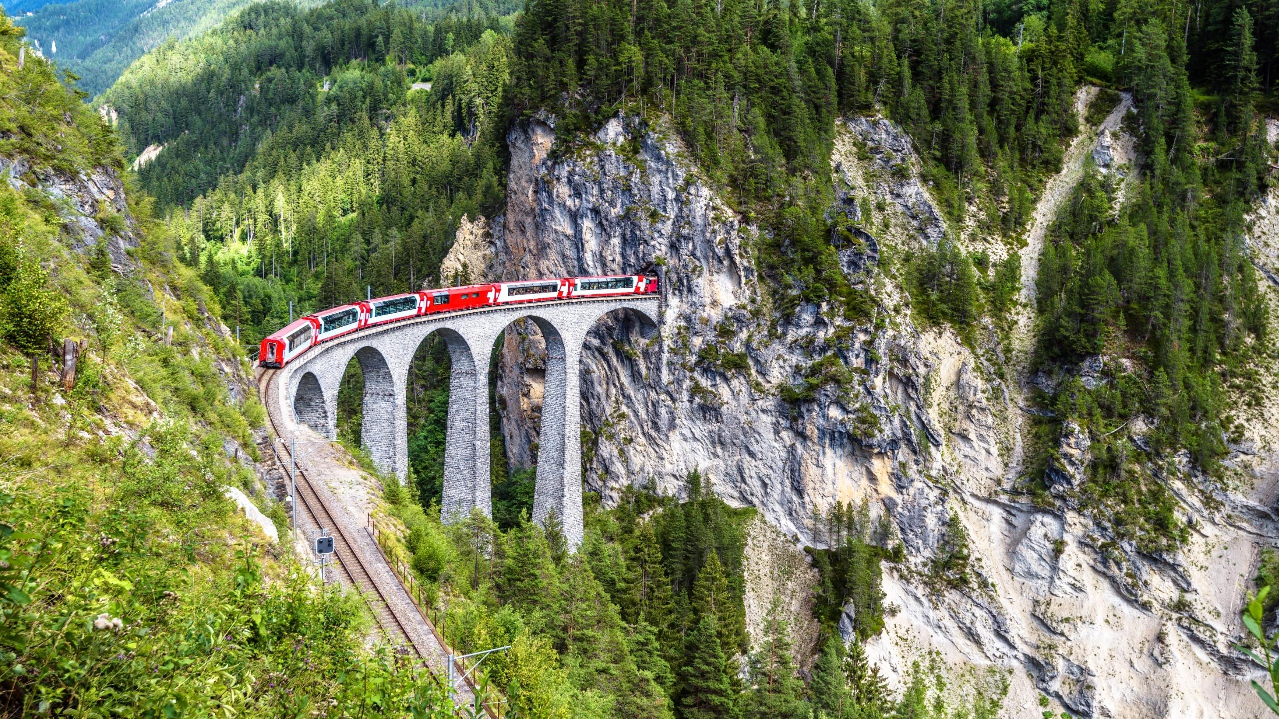 Landscape with Landwasser Viaduct in summer, Filisur, Switzerland. Rhaetian glacier express runs on amazing railway.
